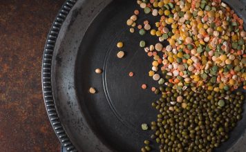 5 Reasons that make unpolished dal superior to polished dal Placer lentils on a pewter plate on the table