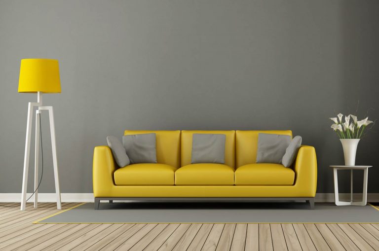 gray living room with yellow sofa